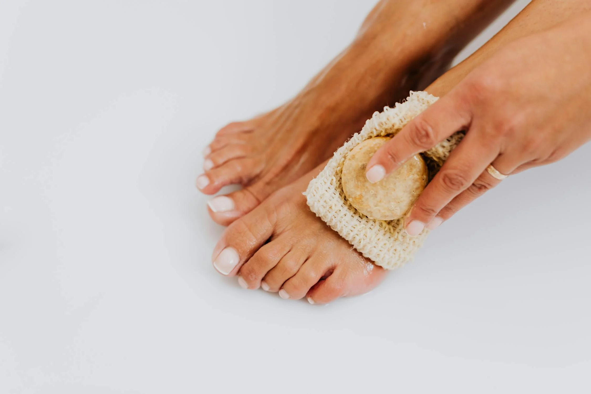 At-home foot care and pedicure preparation — clean, well-maintained feet ready for long-lasting polish