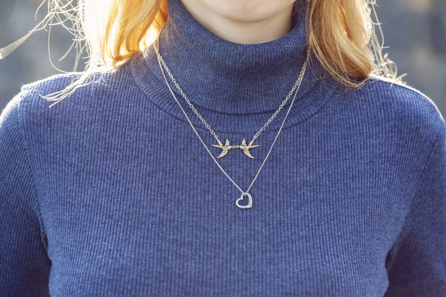 Layering gold and silver necklaces together — mixed metals necklace styling